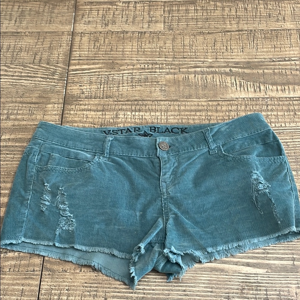 Distressed ribbed teal shorts with Raw Hem